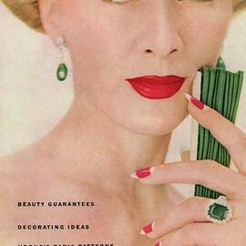 A Vogue Magazine Cover Of Lisa Fonssagrives by Clifford Coffin