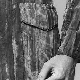 Detail Of A Jacket Pocket by Peter Levy