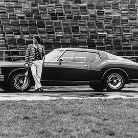 Model with a 1973 Buick Riviera by Peter Levy