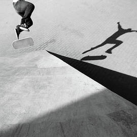 Shadow Of Skateboarder by Mgs