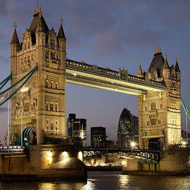 Tower Bridge And London City At Dusk by Kjschoen