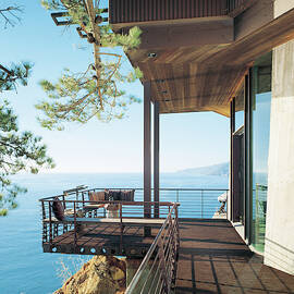 View Of Balcony Near Seaside by Mary E. Nichols