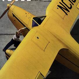 Vogue Magazine Cover Featuring A Young Woman by Anton Bruehl