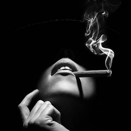 Woman smoking a cigar by Johan Swanepoel